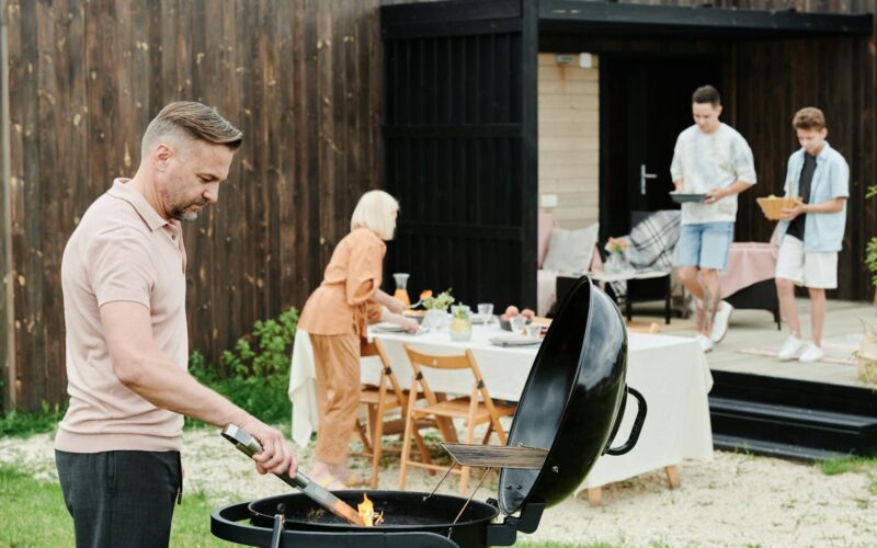 Family enjoying outdoor grilling and dining in Meridian Idaho backyard