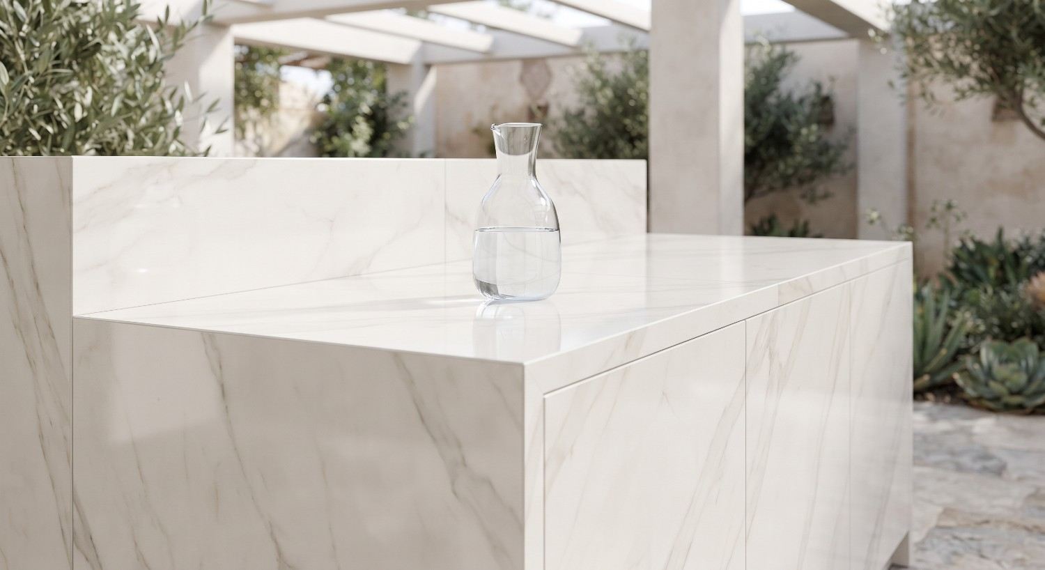 Porcelain counter and pale stone finish on a refreshed outdoor kitchen run