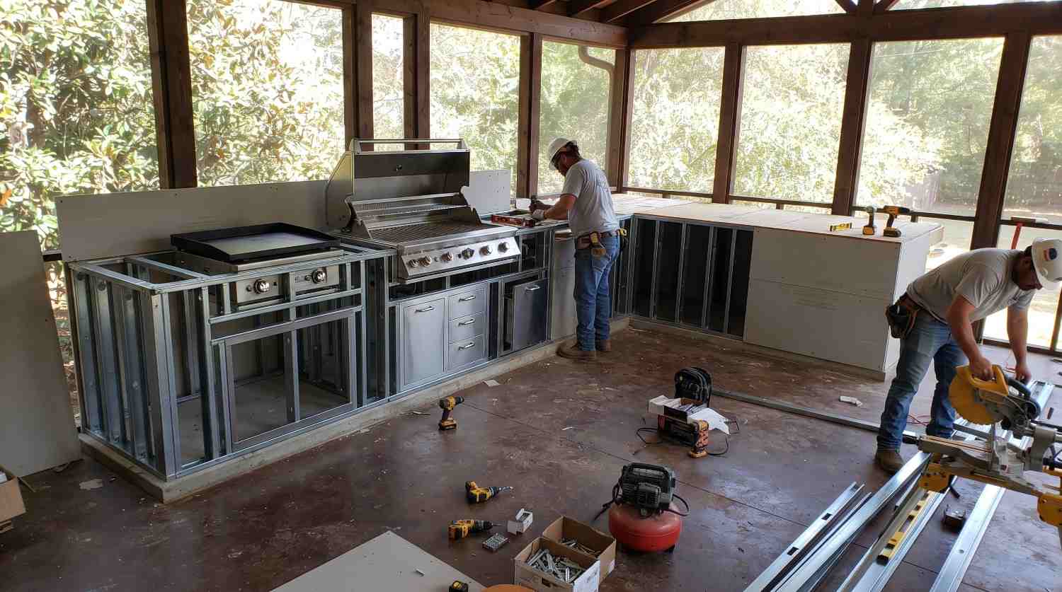 Outdoor kitchen counter run with seating space at one end